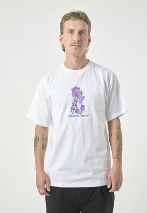 White cotton t-shirt featuring a central purple graphic with hands holding objects, text reading "Embrace the Timeout," and relaxed fit.