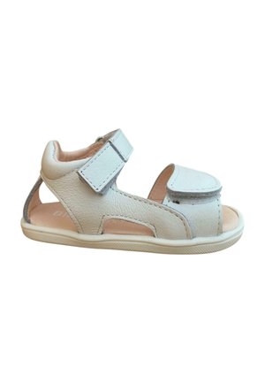 Sándalías de cuero blanco con dos correas ajustables de velcro, diseño cortado, talón abierto, forro interior suave y suela de goma ligera.