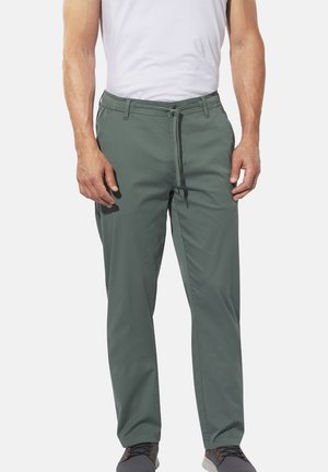 Herren grüne, gerade geschnittene Hose aus weichem Stoff, mit Knopf- und Reißverschluss, seitlichen Eingrifftaschen und einem Kordelzug am Bund.