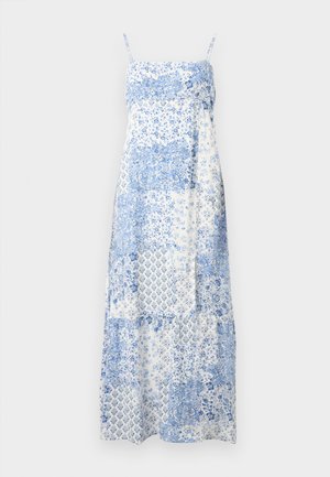 Maxi-jurk in een witte stof met blauw florale en geometrische patronen. Voorzien van dunne bandjes, een getailleerde bovenkant en een losse rok.