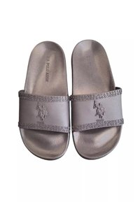 Sandali da spiaggia marroni con una fascia texturizzata e logo impresso. Presentano una soletta liscia e una fascia decorata sulla parte superiore.