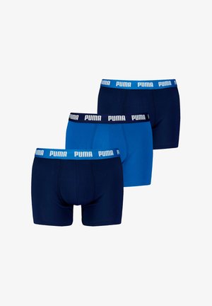 Boxer σλιπ ανδρικά της PUMA σε τρία χρώματα: σκούρο μπλε, ανοιχτό μπλε και ναυτικό. Ελαστική ζώνη με το λογότυπο "PUMA", κατασκευασμένα από ελαστικό βαμβακερό υλικό.
