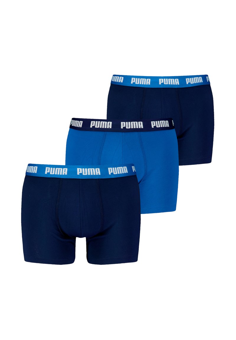 PUMA muški bokserski gaćice u tri boje: tamnoplava, svijetloplava i mornarsko plava. Elastična pojasnica s "PUMA" logotipom, izrađene od rastezljivog pamučnog materijala.