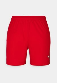 Pantalones deportivos rojos con una cinturilla elástica, textura suave, que presentan un pequeño logo blanco de Puma en la parte inferior derecha.