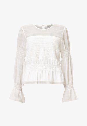 Witte top met een geplooide textuur in het lijfje en de mouwen. Doorzichtige stof op de schouders en uitlopende manchetten. Knopsluiting aan de achterkant.