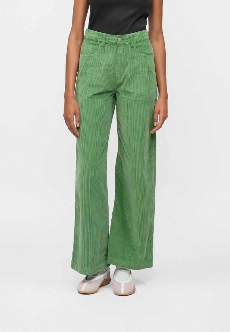Green corduroy wide-leg pants with a high waist, two front pockets, and a single button closure. Features vertical ribbing texture.