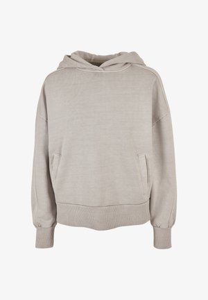 Light beige hoodie made of soft fabric. Features a drawstring hood, front pockets, wide sleeves, and ribbed cuffs and hem.