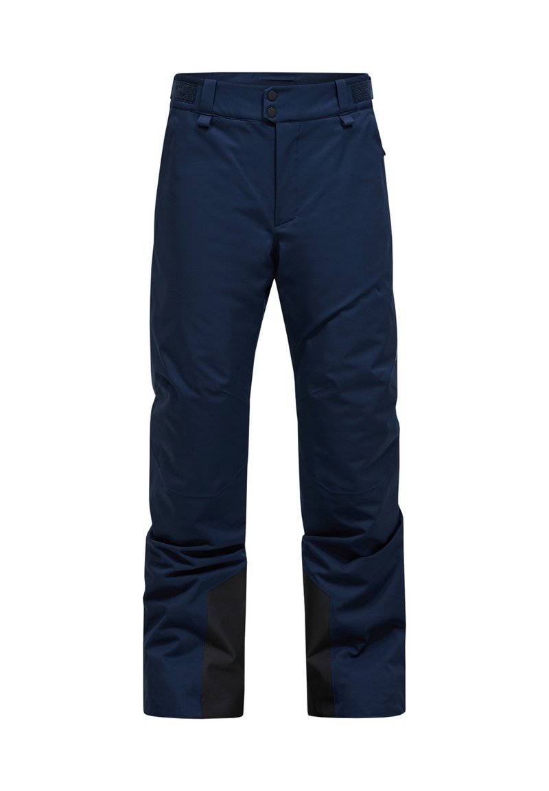 Navy blue ski pants featuring a smooth texture, adjustable waist with Velcro, and black accents on lower legs for durability and style.