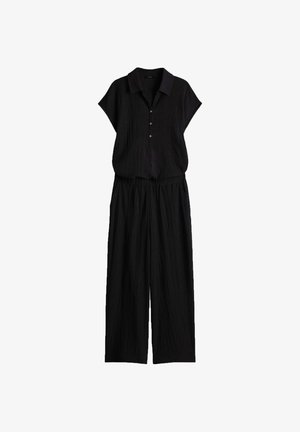 Completo nero strutturato in due pezzi con top a maniche corte con colletto e bottoni e pantaloni a gamba larga, realizzato in tessuto leggero.