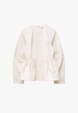 Helles cremefarbenes Peplum-Oberteil mit langen Ärmeln, rundem Halsausschnitt und Reißverschluss. Glattes, strukturiertes Gewebe mit vertikalen Nahtdetails.