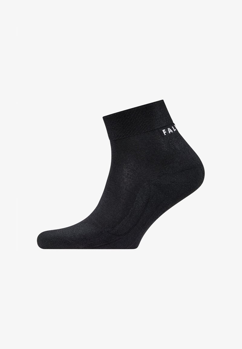 Calcetín negro hasta el tobillo hecho de un material suave y elástico con un puño acanalado. Presenta un sutil lettering de la marca en el lateral.
