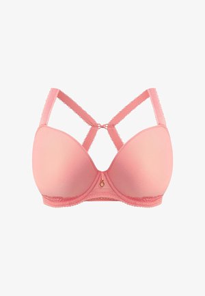 Lichtroze gevoerde beha met een gladde textuur, voorzien van kanten rand, een decoratieve goudkleurige ring in het midden en gekruiste bandjes.