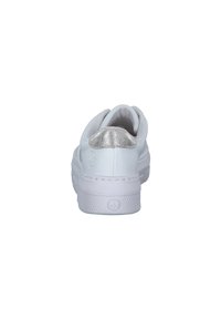 White sneaker with smooth leather upper, rounded toe, textured rubber sole, and a metallic silver heel accent. Rounded heel design.