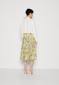 Lollys Laundry MIDI SKIRT - A-linjainen hame - yellow