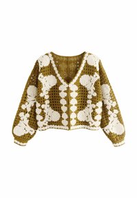 Cardigan all'uncinetto color senape con accenti floreali bianchi, caratterizzato da scollatura a V, maniche lunghe e vestibilità ampia. Design testurizzato con cuciture aperte.