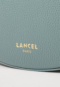 Lancel FAUBOURG HALFMOON - Torba preko tijela - sauge