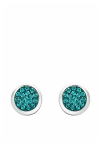 Boucles d'oreilles rondes avec une bordure en métal argenté et un groupe de cristaux turquoise disposés en cercle.