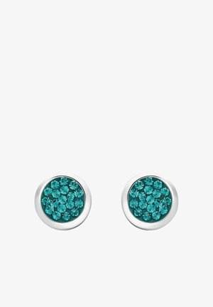 Boucles d'oreilles rondes avec une bordure en métal argenté et un groupe de cristaux turquoise disposés en cercle.