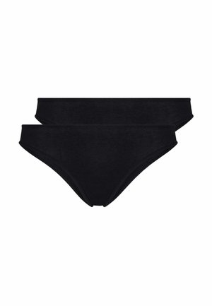 Due slip bikini neri semplici impilati su uno sfondo bianco.