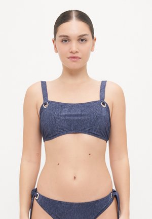 Navy blue bikini top with a square neckline, thin adjustable straps, and metallic rings on the sides, made of textured fabric.