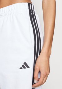 adidas Sportswear Treniņtērpa apakšdaļas - white/black