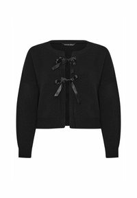 Svart stickad cardigan med en kortad design, utrustad med en rund halsringning och två satängband som knyts framtill. Ribbad fåll och ärmslut.