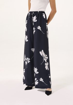 Spodnie materiałowe