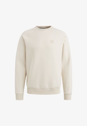 Vaaleanbeige huppari, joka on valmistettu pehmeästä kankaasta. Se sisältää pyöreän pääntien, ribbaatut hihansuut ja helman sekä pienen logopatchin rinnassa.