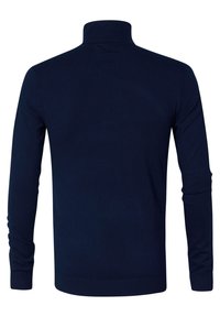 Navyblauwe coltrui gemaakt van zachte gebreide stof, met lange mouwen en een aansluitend design, versierd met geribbelde accenten bij de kraag en mouwen.