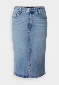 Denim kjol i ljusblått, medellång design och en framspringa. Har fem fickor och knappstängning i midjan.