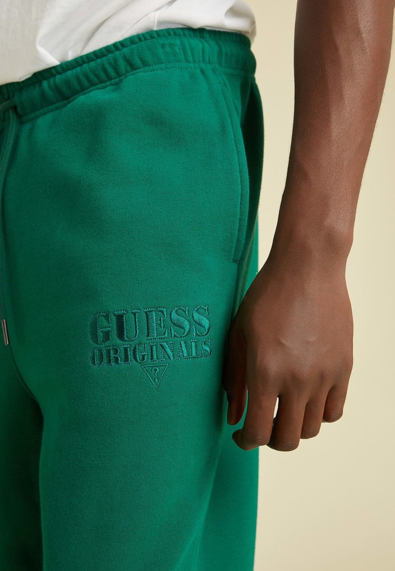 Herren Trainingsanzüge | Guess LOGO Jogginghose grün - HL99718 Herren Trainingsanzüge | Guess LOGO Jogginghose grün - HL99718
