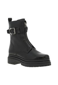 Bottines en cuir noir avec une fermeture éclair sur le côté et un détail de boucle, présentant une semelle texturée et un bout rond pour plus de stabilité.