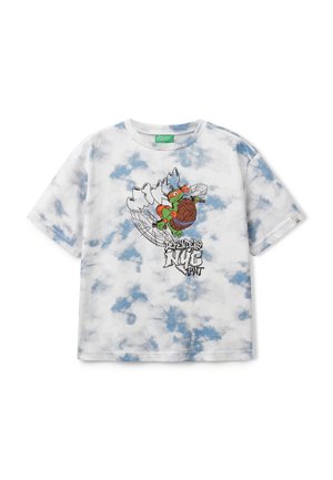 White cotton t-shirt with a blue tie-dye pattern, featuring a graphic print of a cartoon turtle holding a wooden shield and text below.