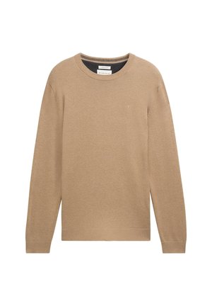 Beige lõngakootud sviiter, millel on ümar kaelus, pikad varrukad ning ribakudumisega mansetid ja alläär. Rinnal on väike logo.