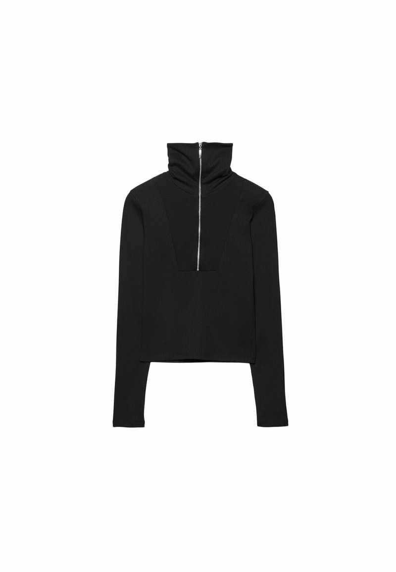 Top nero a coste con collo alto, chiusura a zip parziale frontale e un audace design con ritagli. Maniche lunghe e orlo cropped.