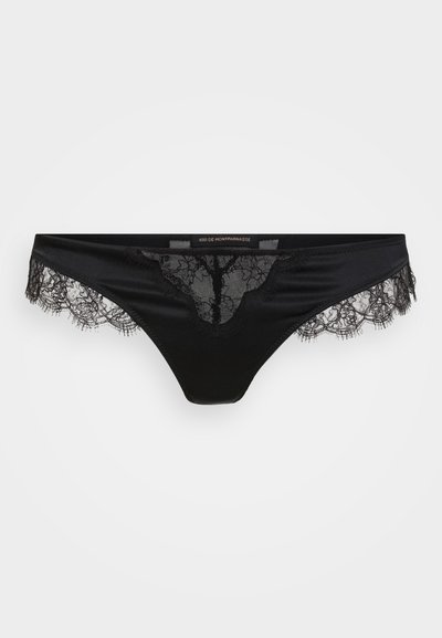 Black thong underwear made of smooth fabric, featuring lace trim along the edges and a floral pattern at the front.