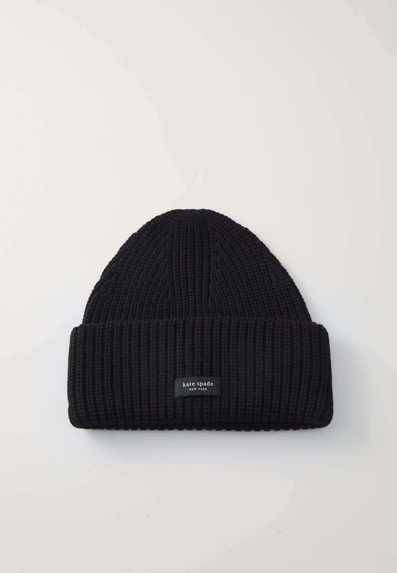 Black knit beanie with a ribbed texture, featuring a folded cuff and a rectangular label that reads "kate spade NEW YORK."