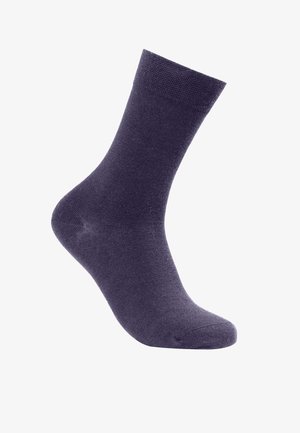 Calcetín de algodón púrpura con talón reforzado, textura suave y puño acanalado. Presenta una puntera sin costuras para mayor comodidad.