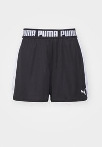 Mustat urheilusortsit, joissa on valkoinen sivupaneeli, elastinen vyötärö, jossa on "PUMA"-logo, sekä pieni logo vasemmassa alalahkeessa. Pehmeä rakenne.