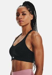 Under Armour - UPLIFT MID - Reggiseno sportivo con sostegno medio - black Immagine in miniatura 1