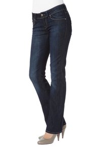 Jeans de mezclilla de color azul oscuro con una silueta ajustada, que cuentan con bolsillos frontales, cremallera y acentos de costura ligera.