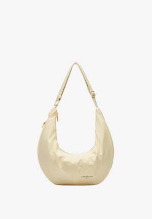 Cremfarbige Hobo-Tasche aus glattem Stoff, mit geschwungener Form, verstellbarem Träger und einem Reißverschluss mit Branding an der Unterseite.