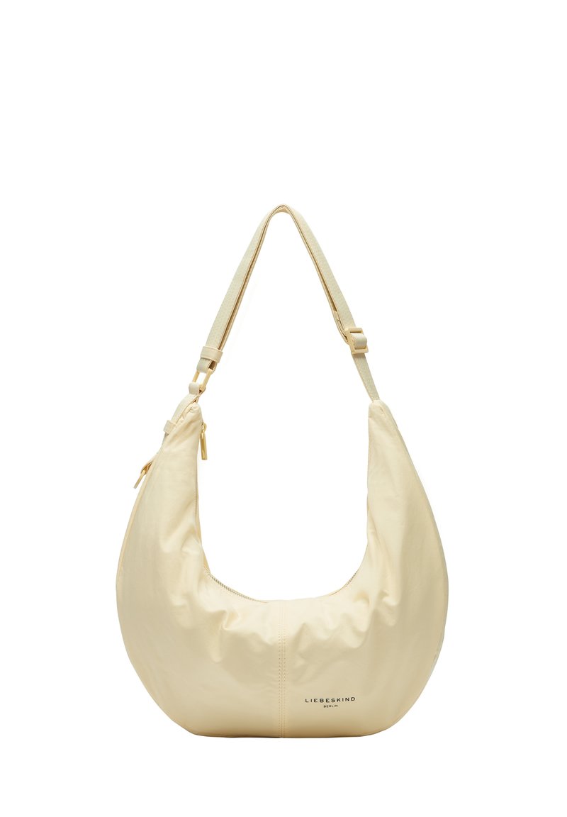Cremfarbige Hobo-Tasche aus glattem Stoff, mit geschwungener Form, verstellbarem Träger und einem Reißverschluss mit Branding an der Unterseite.