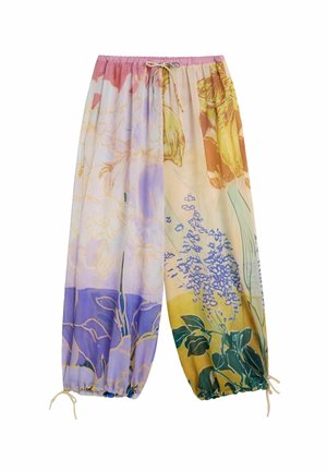 Pantalon ample à fleurs avec une taille élastique et des cordons réglables aux chevilles, aux tons pastel rose, violet, jaune et vert.