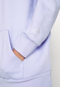 adidas Performance Jersey con capucha - purple
