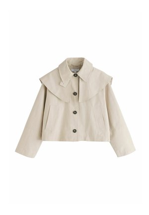 Beige cropped jacket with large pointed collar flap, four black buttons down front, long sleeves, and side slit pockets.