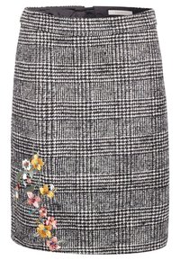 Schwarz-weiß karierter Rock mit seitlichem Reißverschluss und bunten, gestickten Blumen am Saum auf der linken Seite.