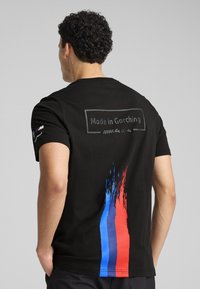 Puma - Print T-shirt - black Thumbnail Image 1