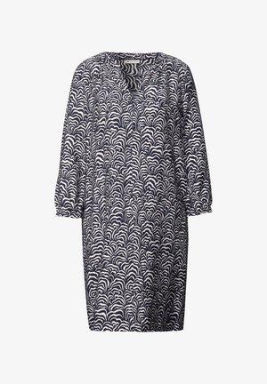 Marineblaues Kleid mit Wellenmuster in Weiß, V-Ausschnitt und drei Viertel Ärmeln. Hergestellt aus leichtem Stoff mit lockerem Schnitt.