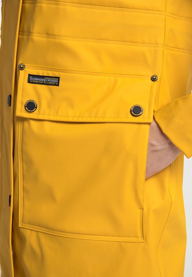 Schmuddelwedda Parka yellow/gelb (Pre-owned) Zalando